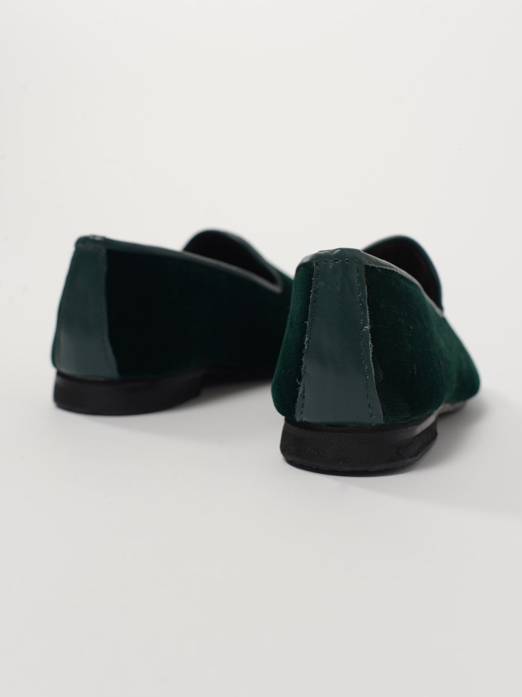 Velvet and leather slippers