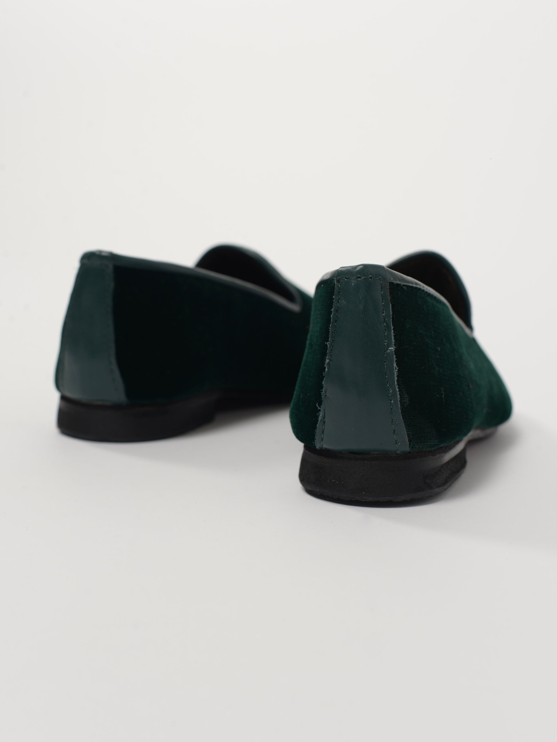 Velvet and leather slippers