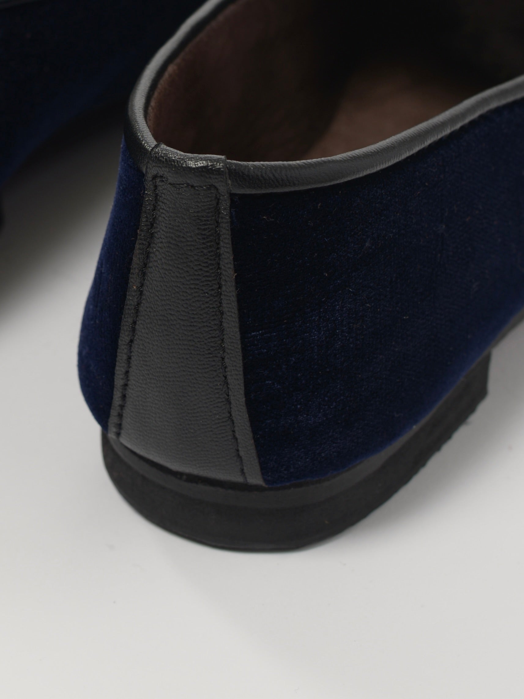 Velvet and leather slippers