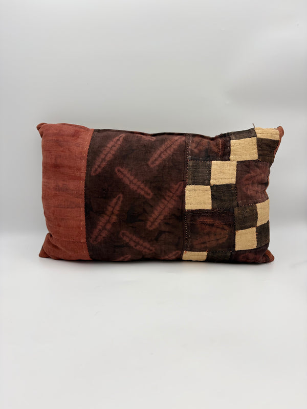 Coussin Ntshak raphia tissé main bordeaux - Artisanat Congo
