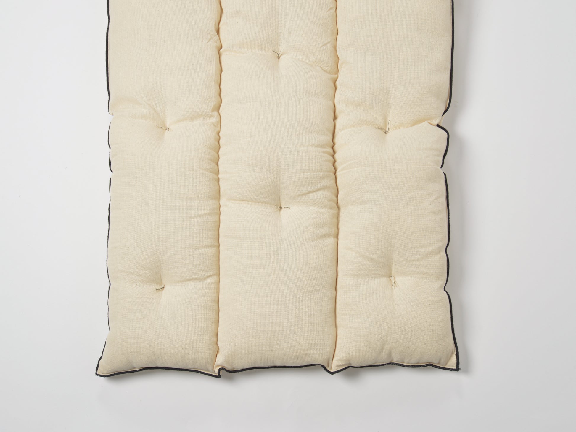 Sur Matelas Tensira Crème à Bordures Noires