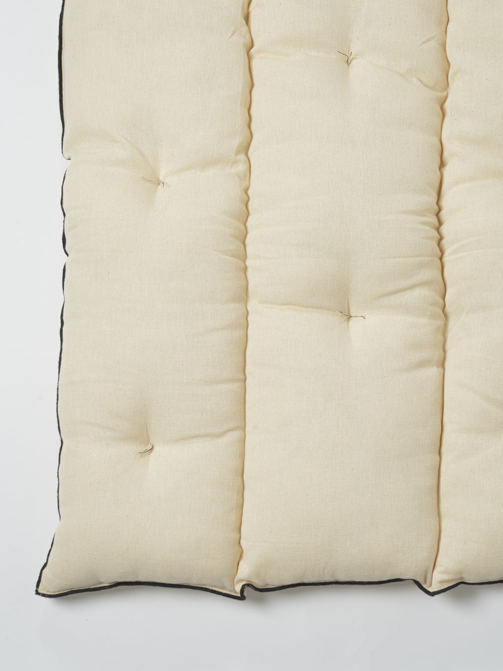 Sur Matelas Tensira Crème à Bordures Noires