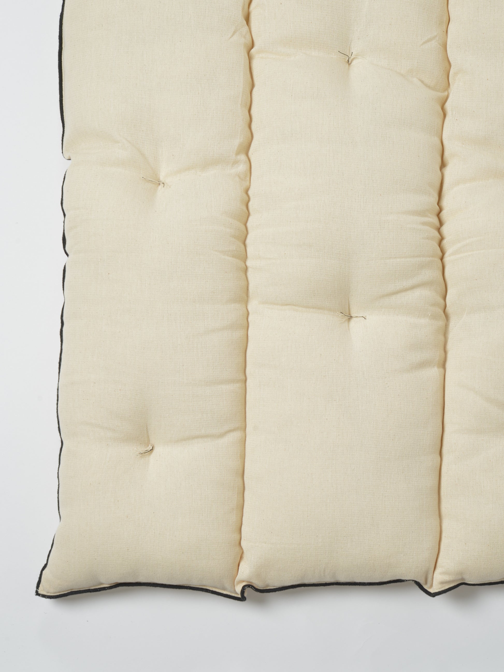 Sur Matelas Tensira Crème à Bordures Noires